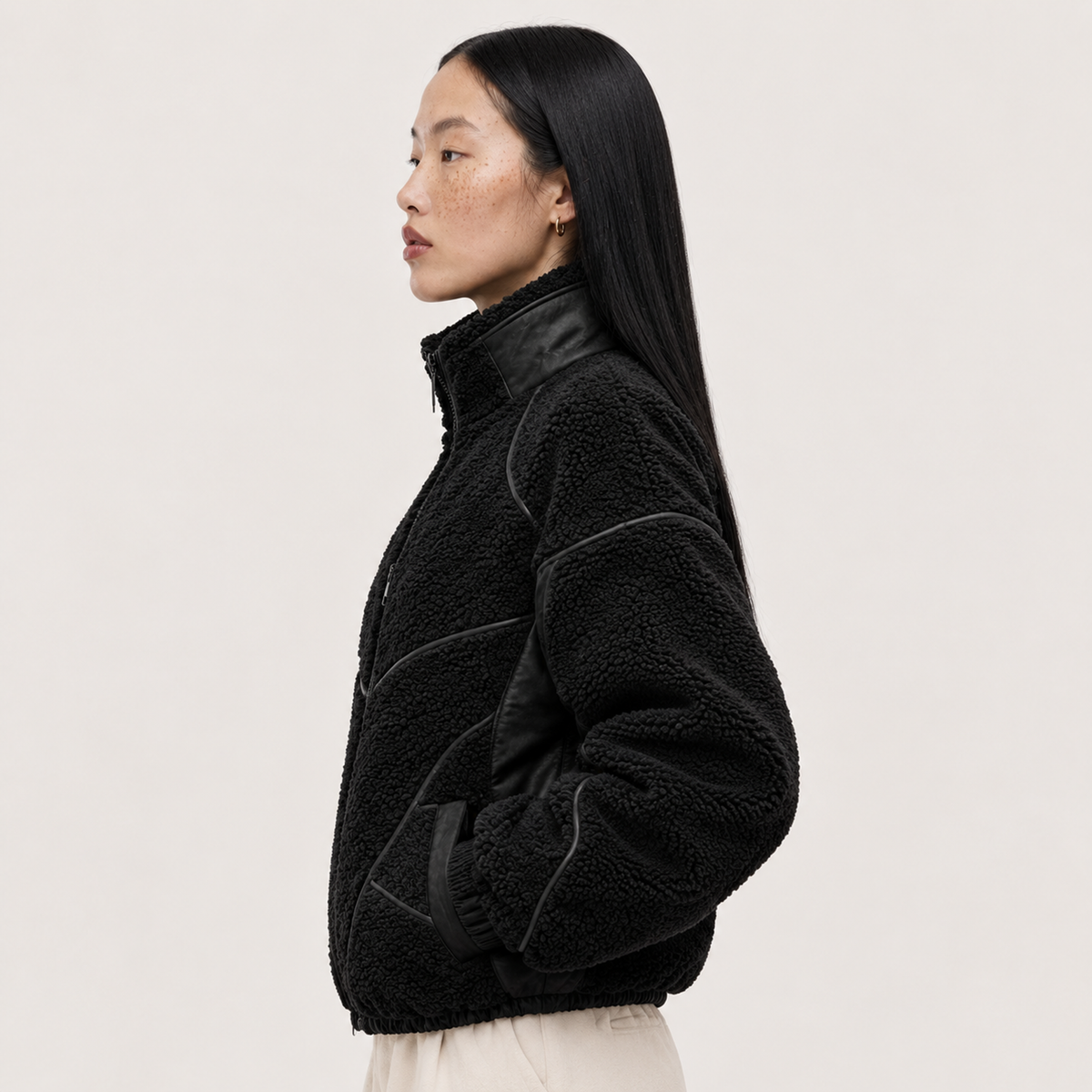 “Rebel Checkpoint” – Varsity leather with checker print and sporty construction