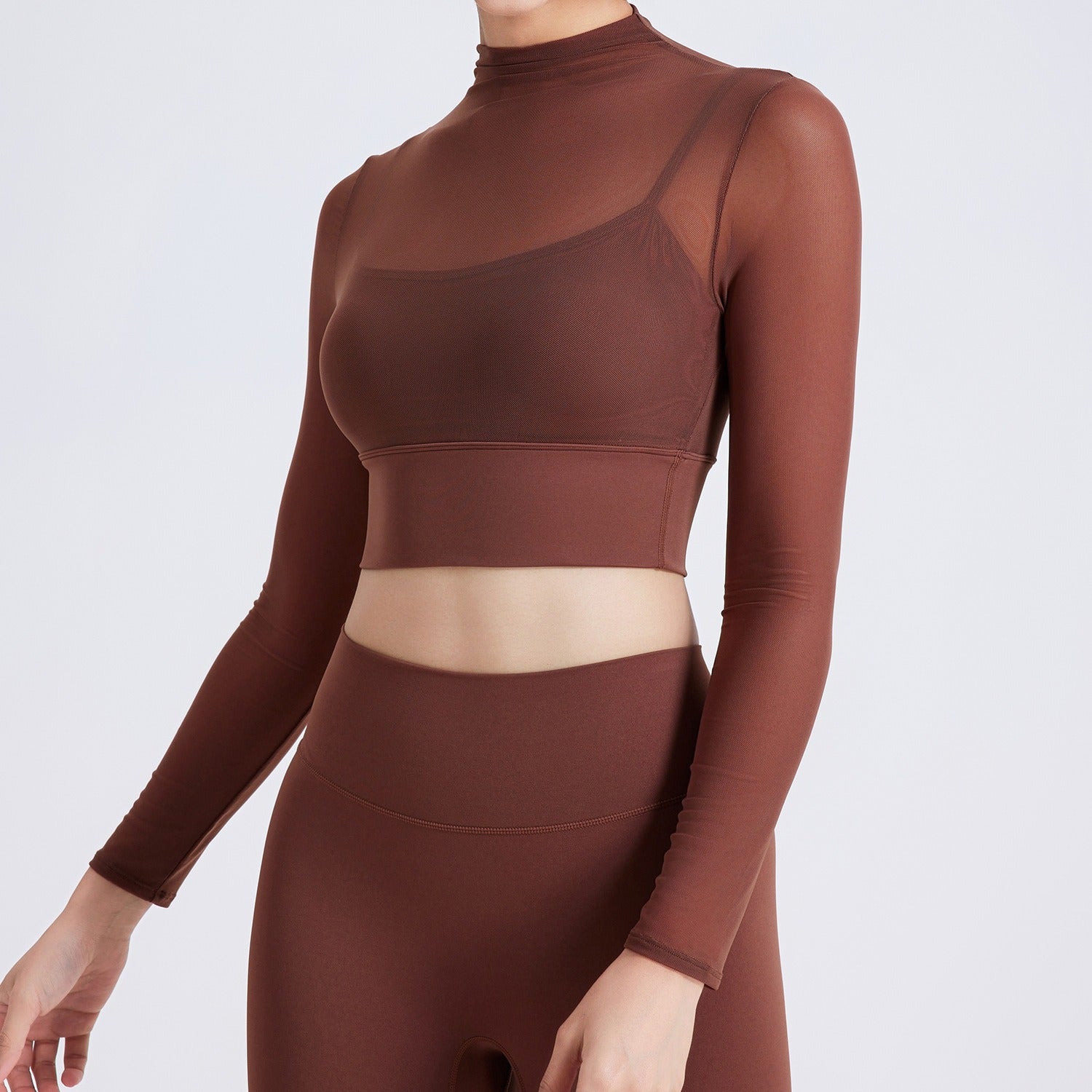 Seduci lo sport – Top Fitness a Maniche Lunghe con Mesh e Coppa Integrata