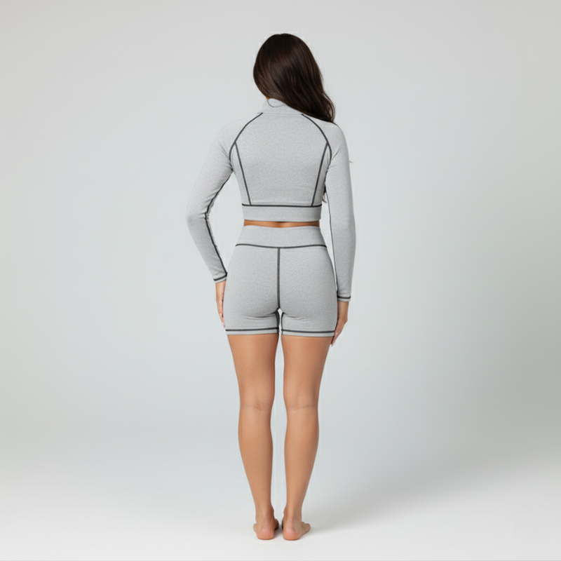 Steel Motion – Set sportivo tecnico in grigio con dettagli a contrasto