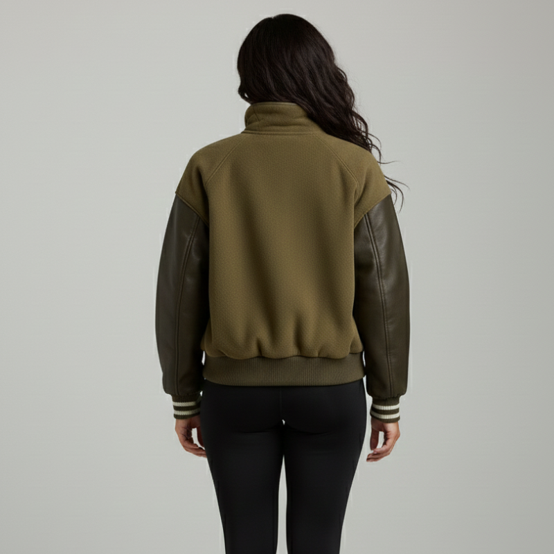 “Gridline WB” – Varsity strutturato con corpo testurizzato e maniche in pelle premium