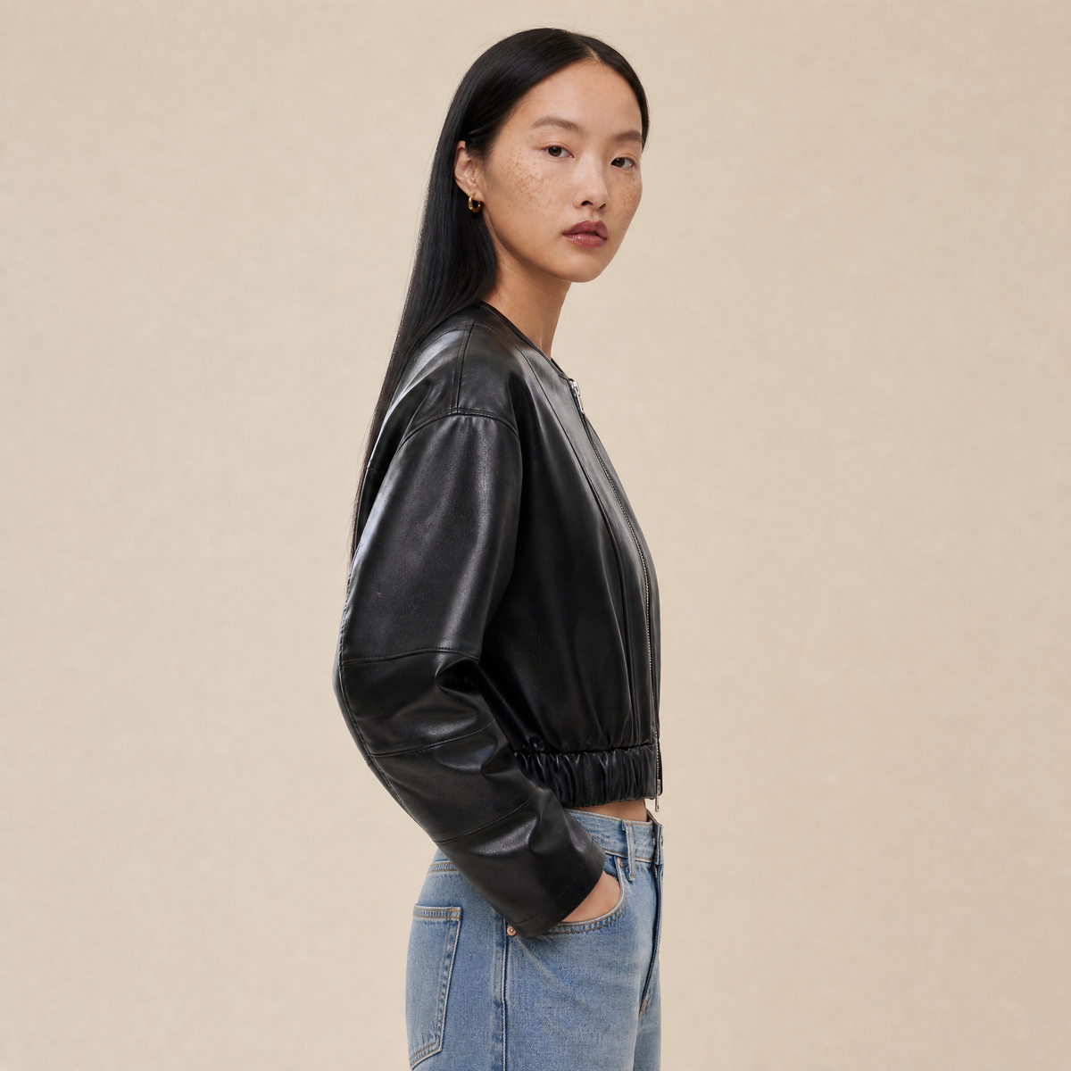 “Rebel Checkpoint” – Varsity leather with checker print and sporty construction