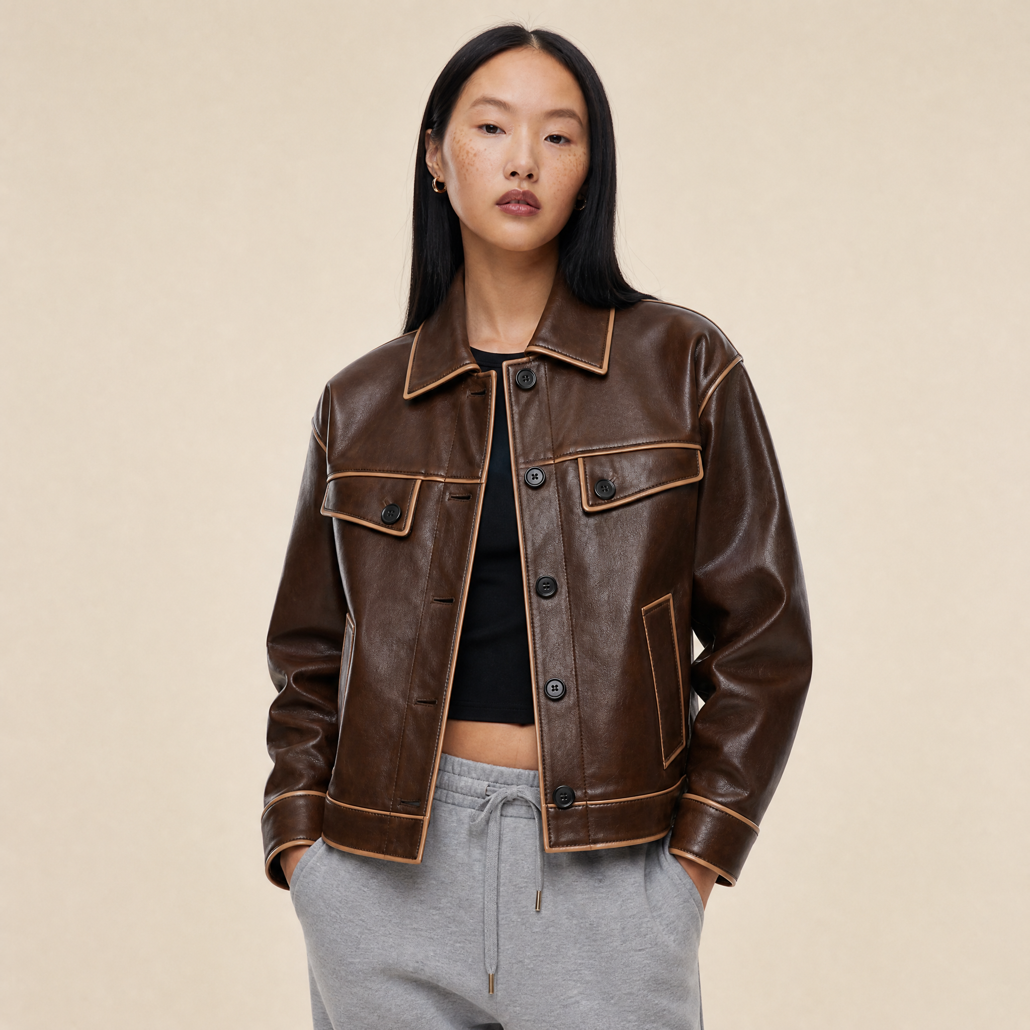 “Rebel Checkpoint” – Varsity leather with checker print and sporty construction