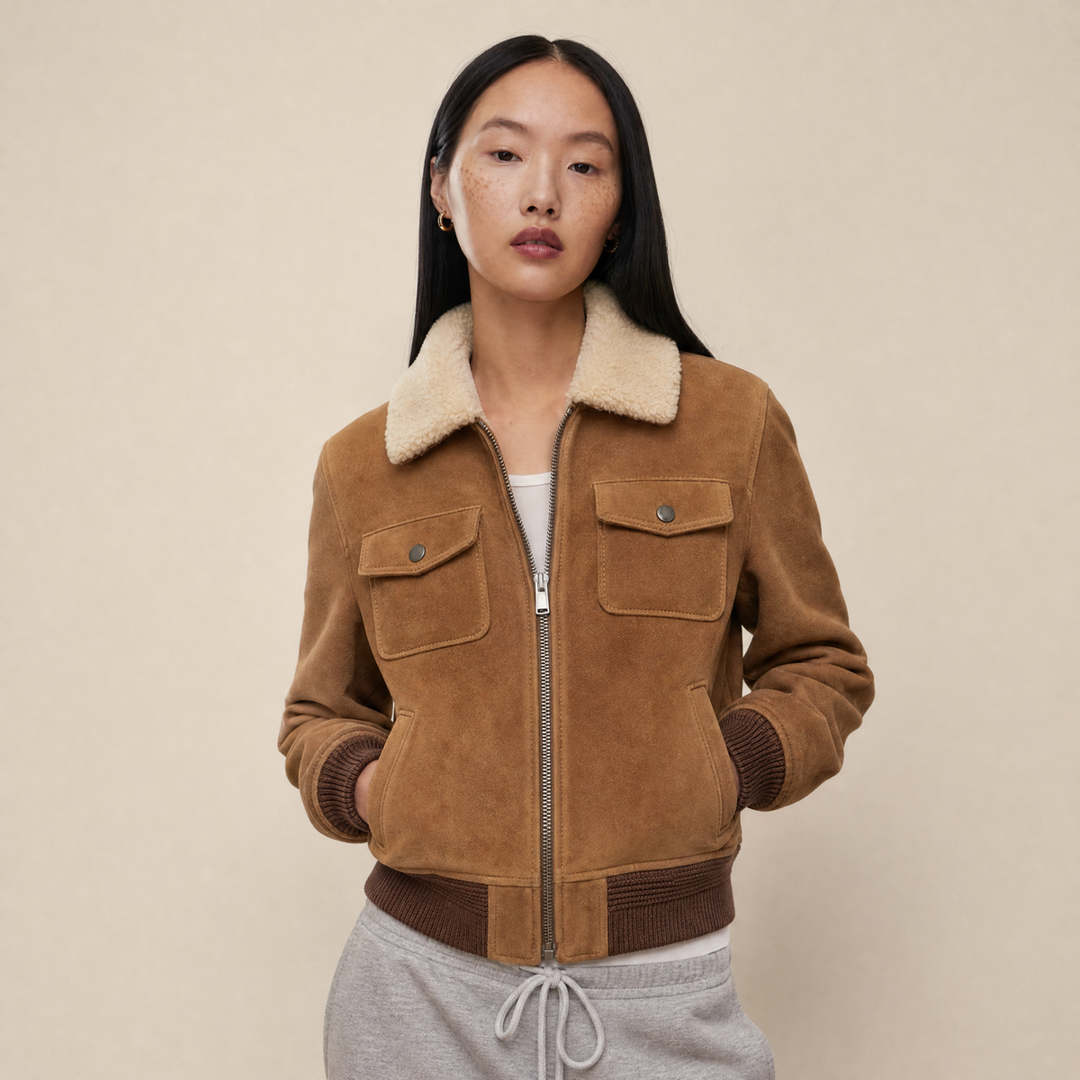 “Rebel Checkpoint” – Varsity leather with checker print and sporty construction