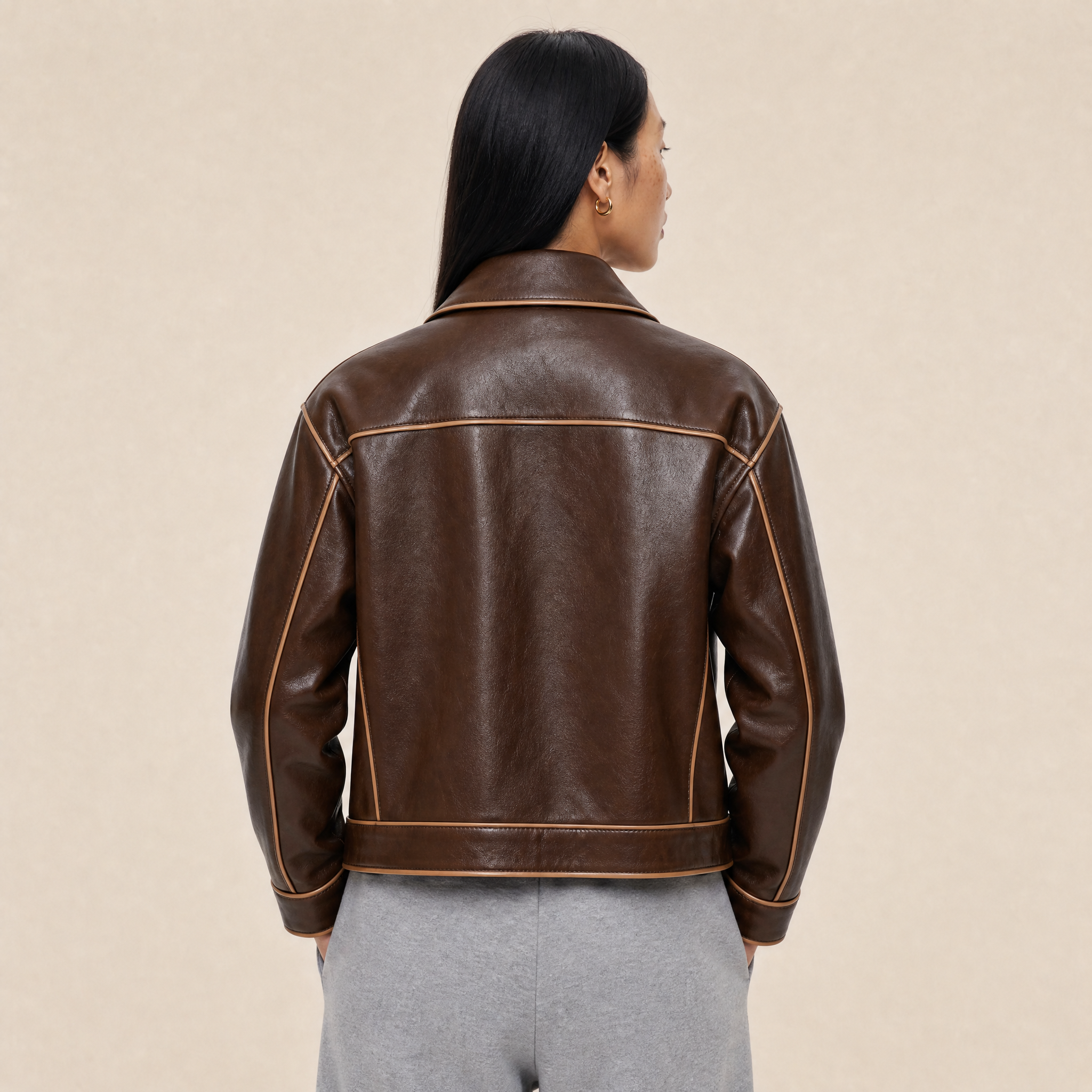 “Rebel Checkpoint” – Varsity leather with checker print and sporty construction