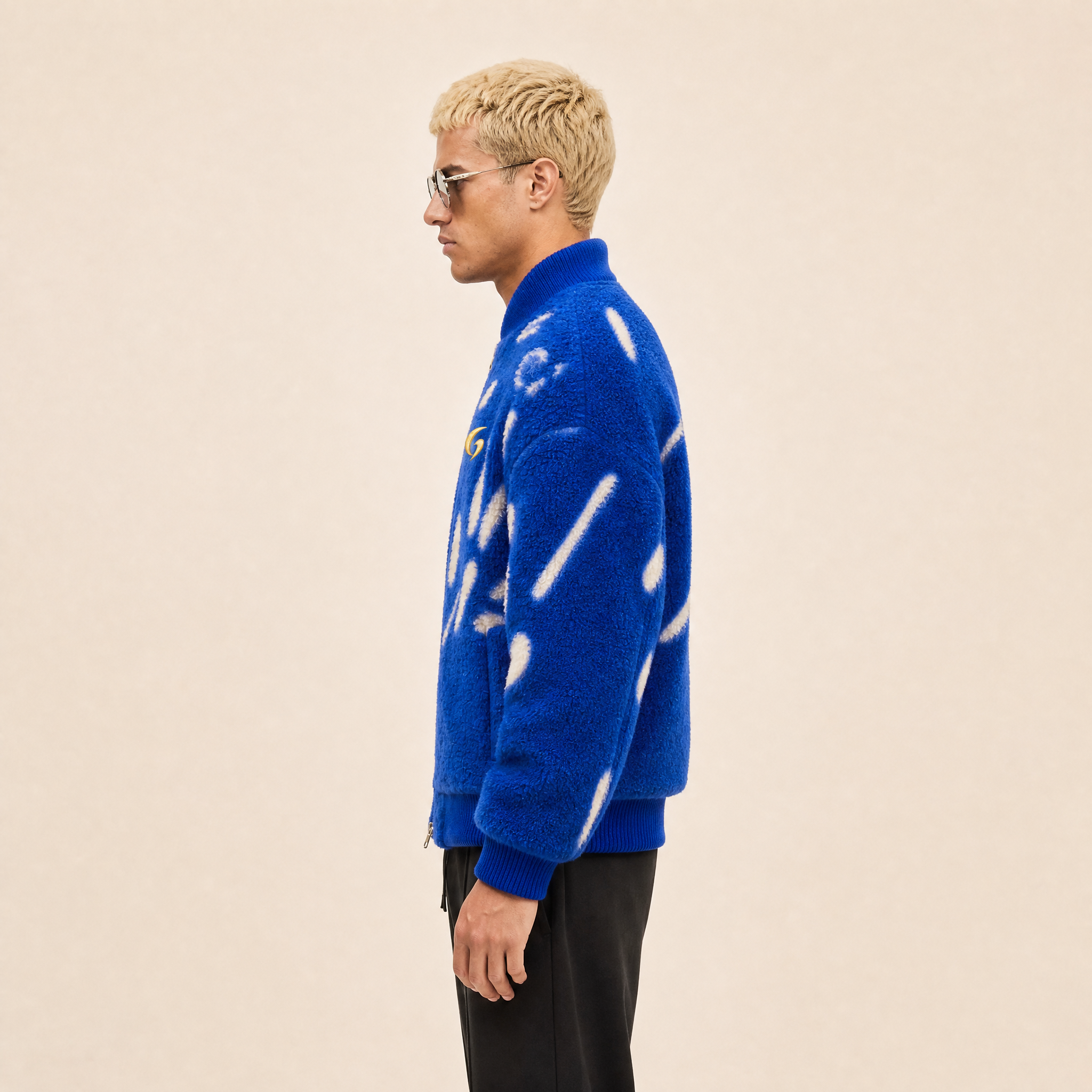 “Rebel Checkpoint” – Varsity leather with checker print and sporty construction