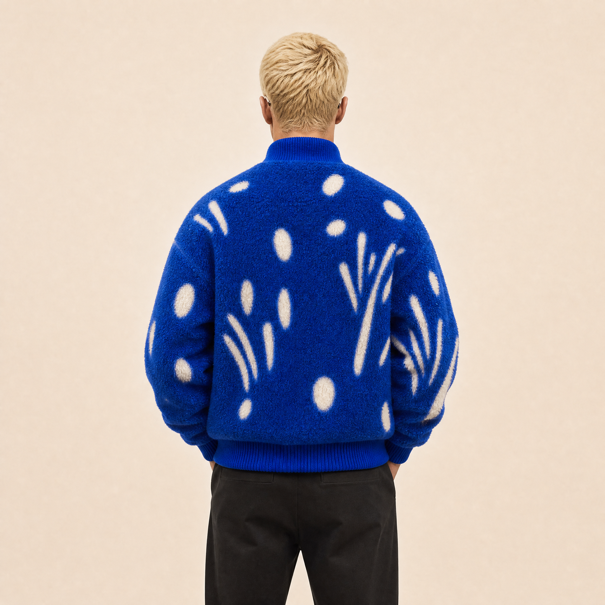 “Rebel Checkpoint” – Varsity leather with checker print and sporty construction